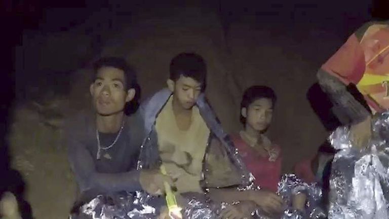 Members of the young boys' football team are seen in the cave in Chiang Rai, Thailand, on July 4