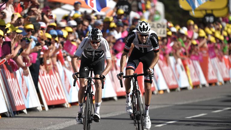 Defending champion Chris Froome (left) moved up to second in the general classification after finishing third on stage 11
