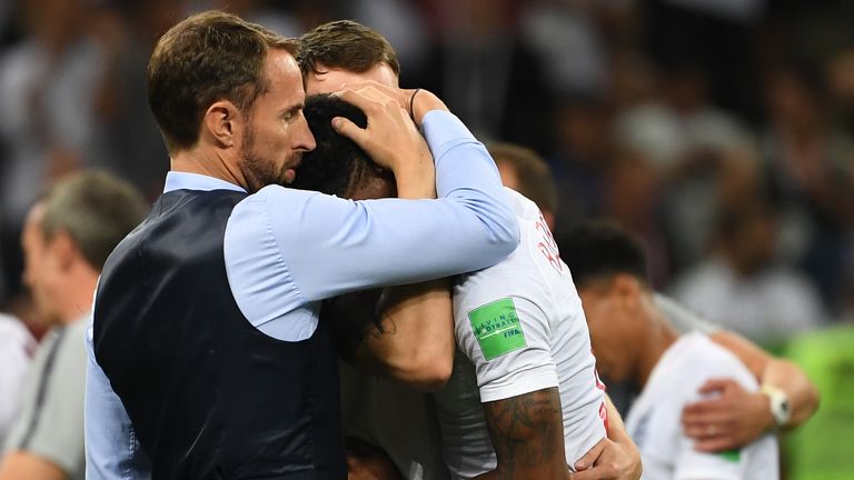 Southgate embraces Marcus Rashford after the Russia 2018 World Cup semi-final defeat