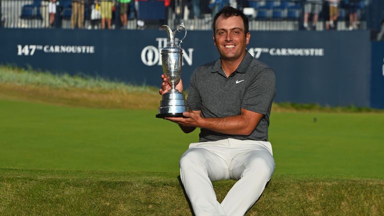 Molinari proudly displays the Claret Jug