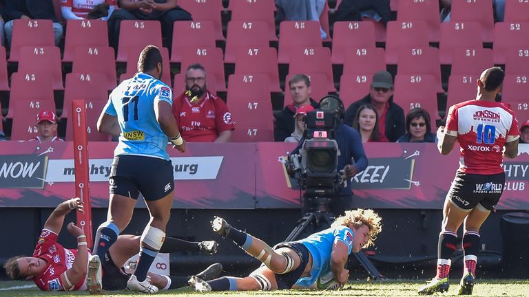 Waratahs flanker Ned Hanigan scored the first try of the day after a powerful run from Taqele Naiyaravoro