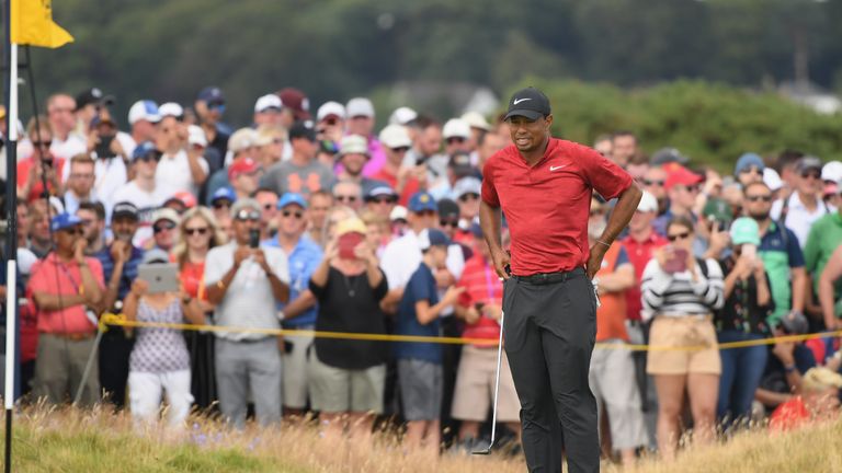 Tiger Woods held the outright lead at the turn