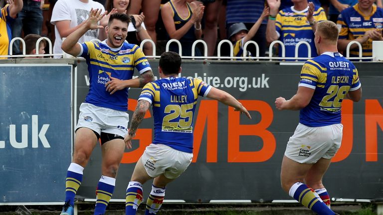 Tom Briscoe celebrates scoring the first try of the game