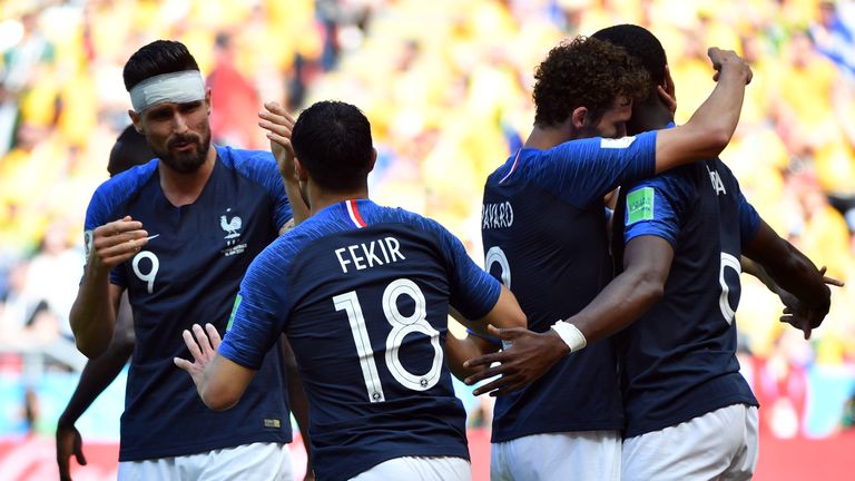 Olivier Giroud and Nabil Fekir in action for France