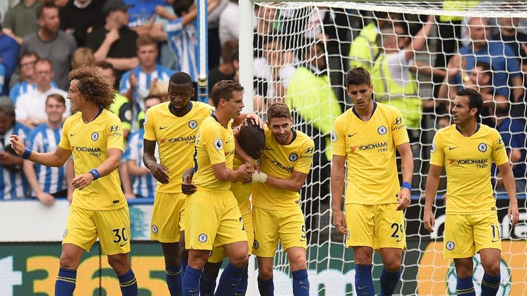 N'Golo Kante is mobbed by his Chelsea team-mates