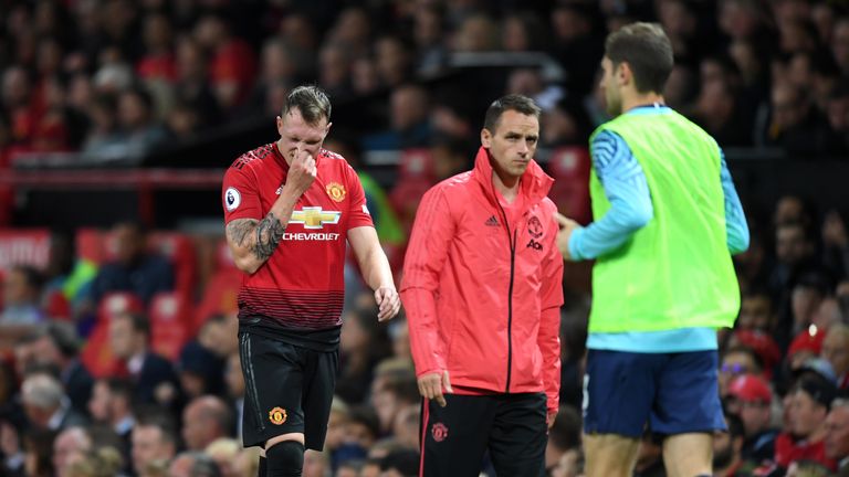 Jones leaves the pitch after picking up an injury on Monday