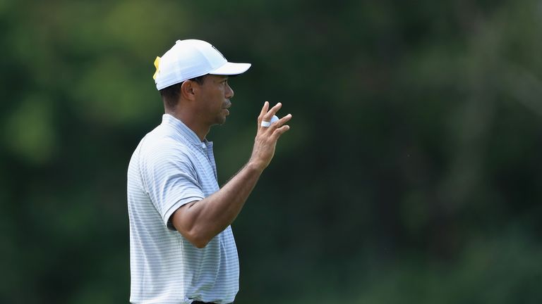 Tiger Woods got off to a hot start before the storms arrived