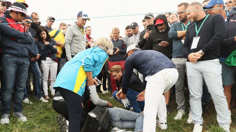 Brooks Koepka offered a signed glove to the injured spectator