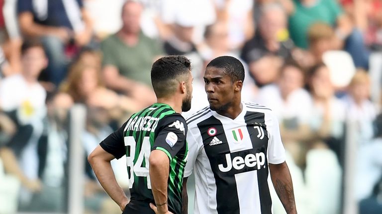 Douglas Costa was sent off in stoppage time after video cameras caught him spitting at Federico Di Francesco