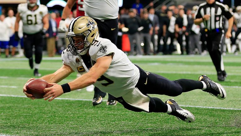   Drew Brees Dives Into a Touch if he leads the Saints to & # 39; An exciting win. 