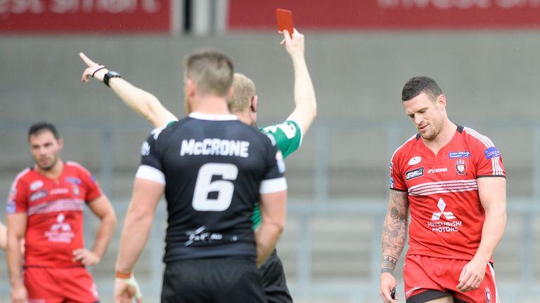 Salford's Luke Burgess is shown a red card for a high tackle