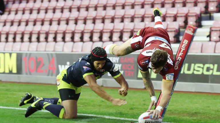 Wigan's Oliver Gildart scores a superb try against Super League rivals Wakefield