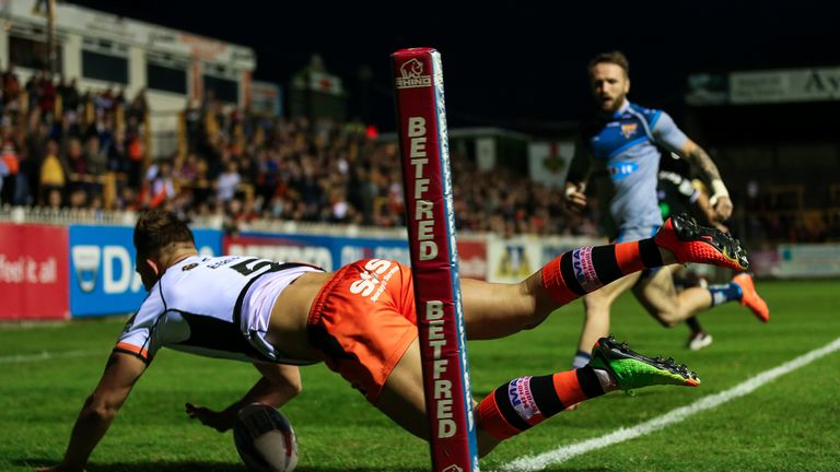 Castleford's Greg Eden dives in to score a try