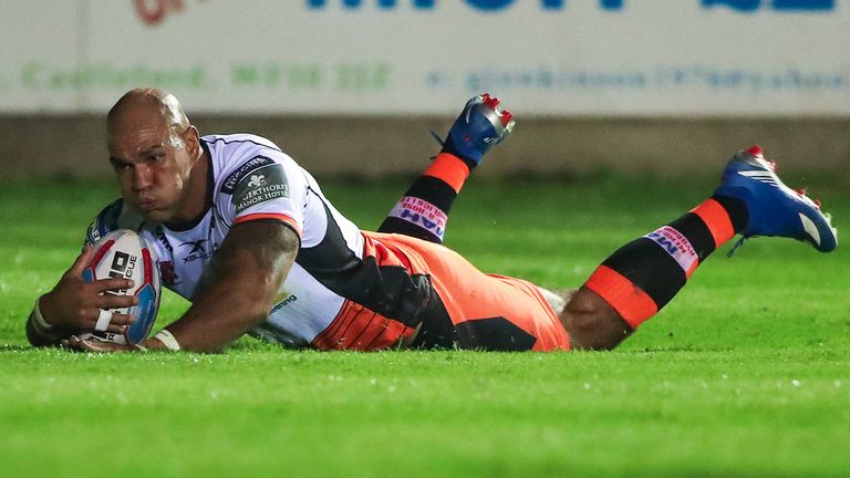 Castleford's Jake Webster slides in to score