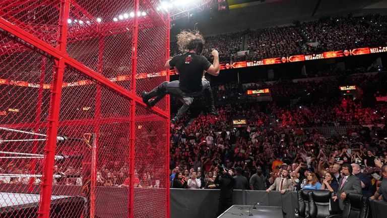 Relive the moment Dolph Ziggler and Seth Rollins fell from the Hell In A Cell structure and through the commentary desks