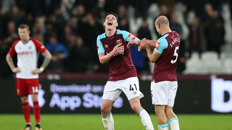 Pablo Zabaleta (R) jokes with Declan Rice