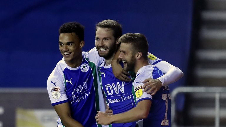 Nick Powell celebrates Wigan's winner