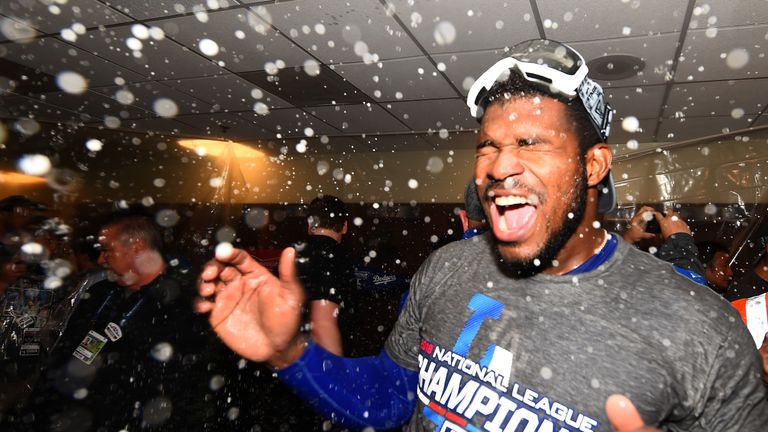 Puig was at the centre of celebrations in the Dodgers locker room at Miller Park after their Game Seven success