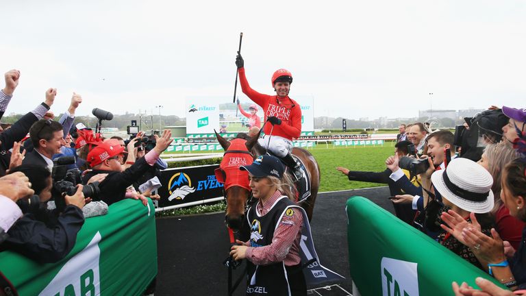 Kerrin McEvoy celebrates as Redzel wins the Everest