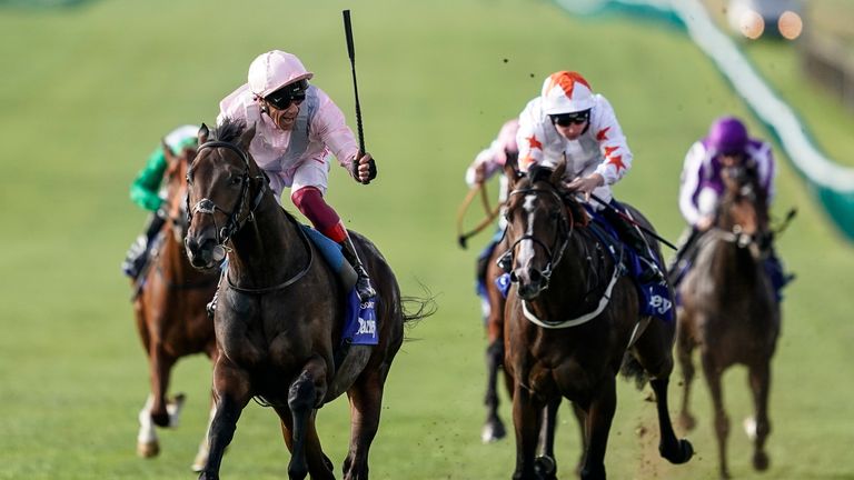 Frankie Dettori celebrates as Too Darn Hot wins the Dewhurst