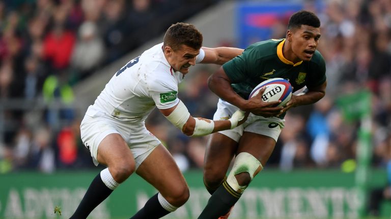 Damian Willemse tries to break from Henry Slade