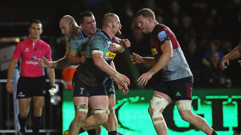 James Chisholm of Harlequins celebrates scoring his side's first try