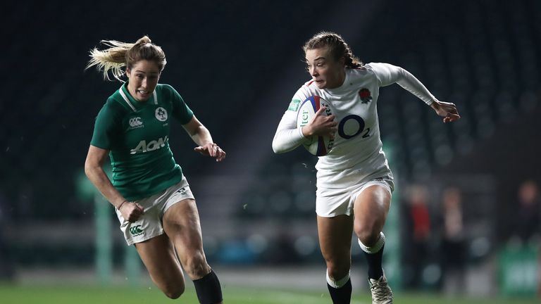 Kelly Smith of England runs for the line to score a try