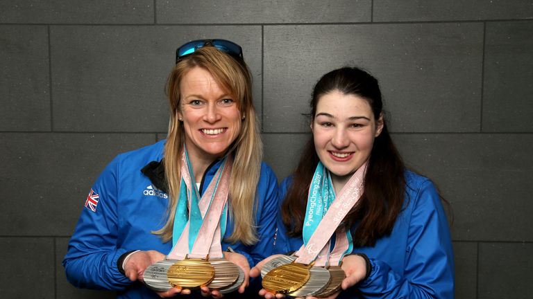 Jen Kehoe and Menna Fitzpatrick (R) showcasing their medals from the 2018 Paralympic Winter Games in PyeongChang 