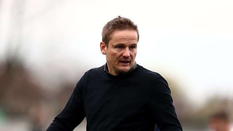 Neal Ardley only left AFC Wimbledon less than two weeks ago