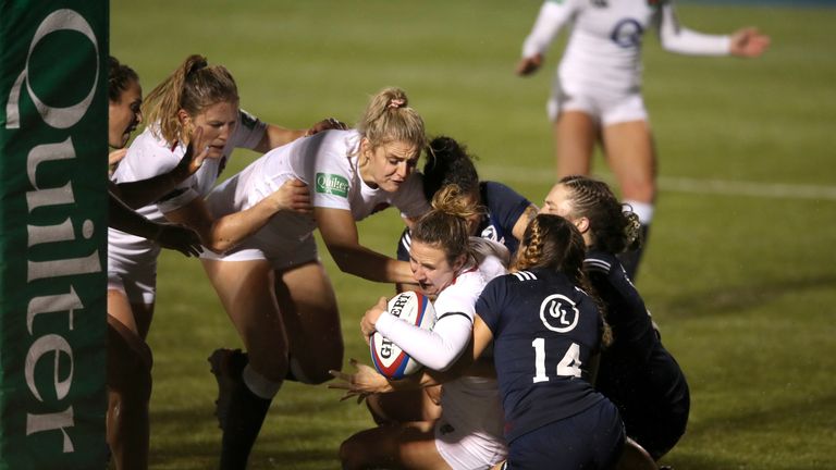 England's Sarah McKenna dives in to score