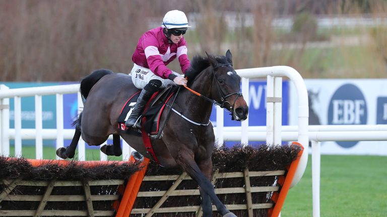 Apple's Jade, ridden by Jack Kennedy, jumps the last before going on to win the Squared Financial Christmas Hurdle