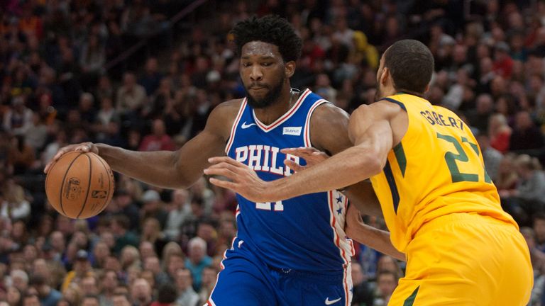 Joel Embiid backs down Gobert