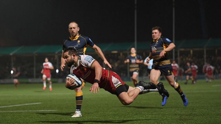 Cobus Reinach dives over the line for Northampton's first try