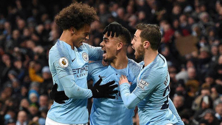 Gabriel Jesus celebrates his first goal with Leroy Sane and Bernardo Silva