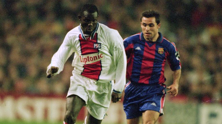 George Weah in action for Paris Saint-Germain against Sergi of Barcelona in 1995