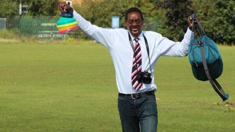 Macharia serves as the Bisons' club photographer