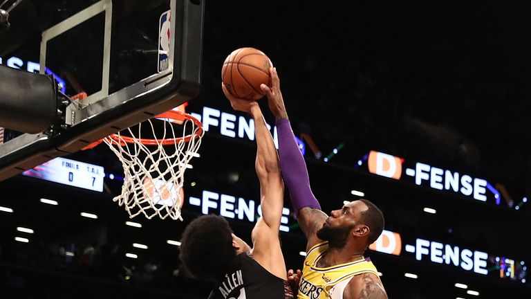 Jarrett Allen rejects LeBron James' attempted dunk during the Brooklyn Nets' clash with the Los Angeles Lakers
