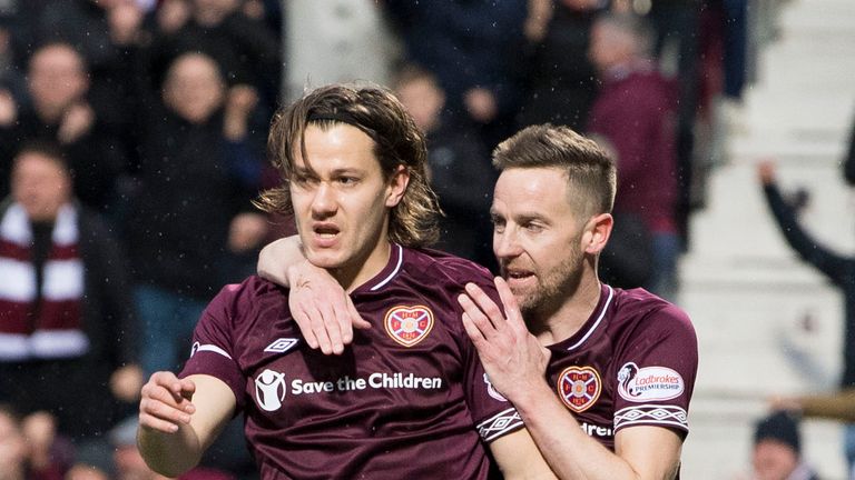Hearts' Peter Haring (L) celebrates his goal with team-mate Steven MacLean