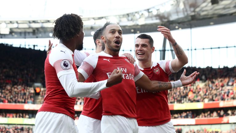 Pierre-Emerick Aubameyang celebrates with team-mates after opening the scoring