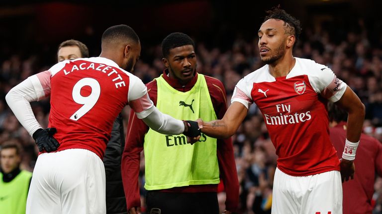 Aubameyang celebrates with Alexandre Lacazette