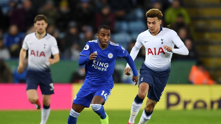 Ricardo Pereira runs past Alli during the match at the King Power Stadium