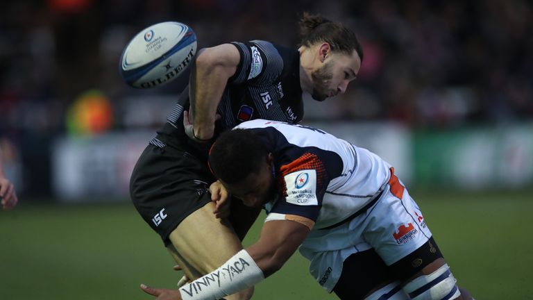 Tom Arscott  is tackled by Viliame Mata 