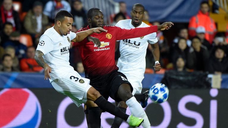 Valencia's Ruben Vezo challenges Romelu Lukaku
