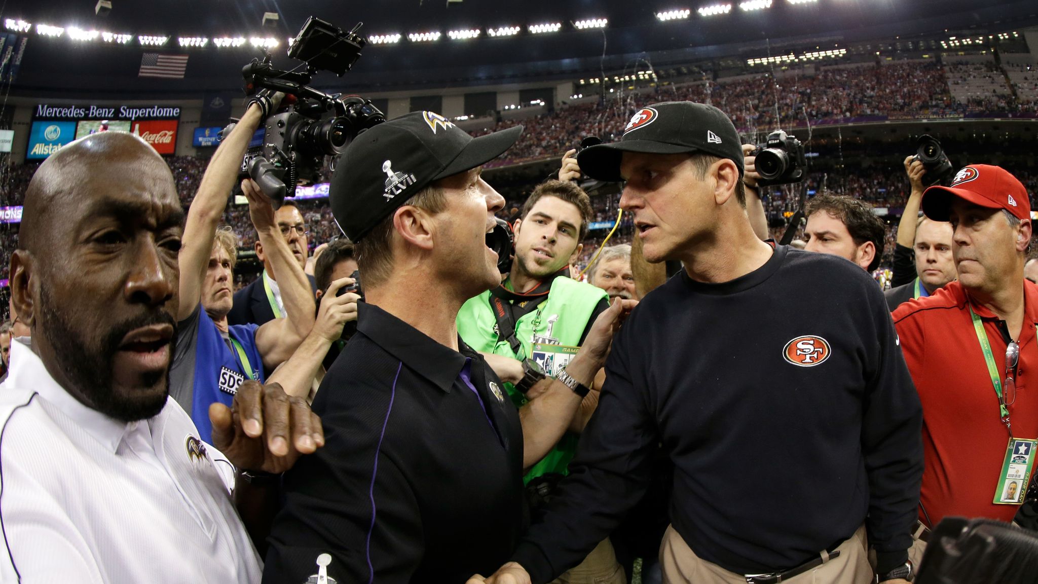 Baltimore, USA. 21st Oct 2018. Baltimore Ravens head coach John Harbaugh  congratulates players after a fumble recovery during a game against the New  Orleans Saints at M&T Bank Stadium in Baltimore, MD