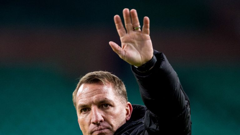 Brendan Rodgers applauds the fans at full time