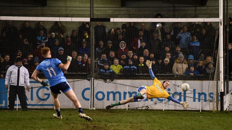 Tucked away: Aaron Byrne of Dublin scores a penalty against Barry Dardis of Meath during the penalty shootout