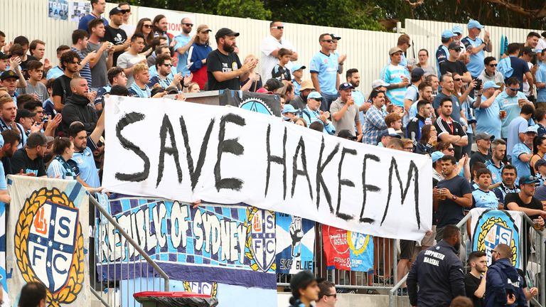 Sydney FC fans display a sign in support for Hakeem al-Araibi