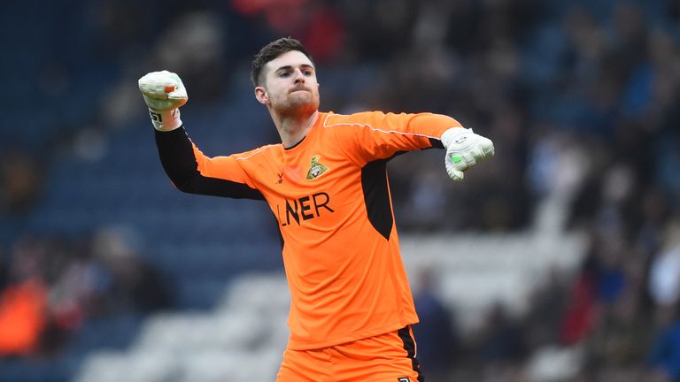Ian Lawlor celebrates Doncaster's win