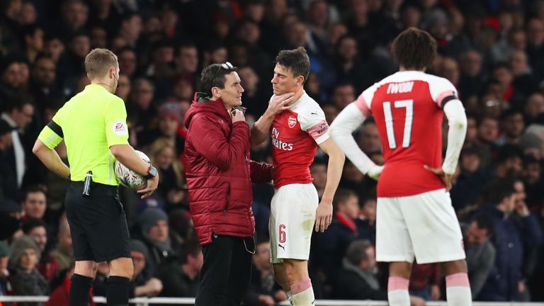 Laurent Koscielny suffered a facial injury shortly after the hour mark