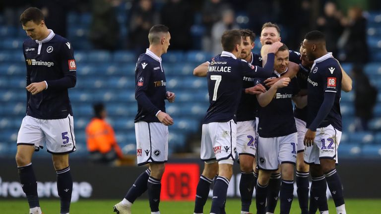 Millwall players celebrate their team's first goal
